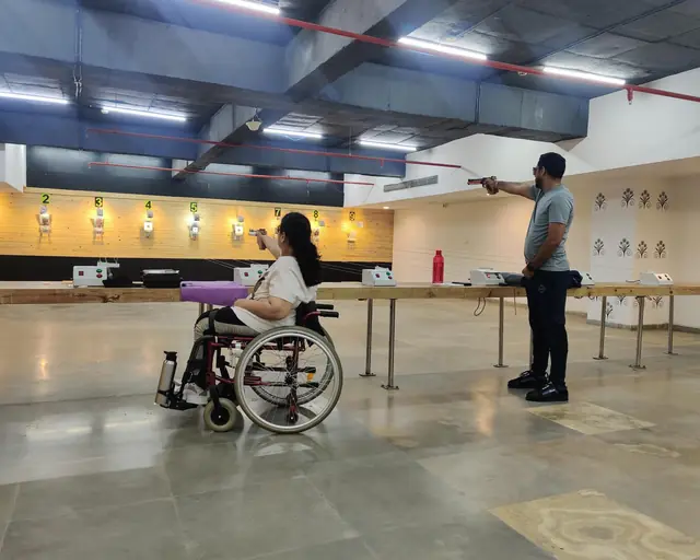 Para shooter training from a wheelchair on the air pistol range