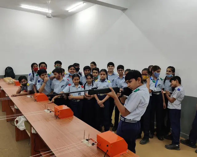 School students at a rifle shooting introduction session